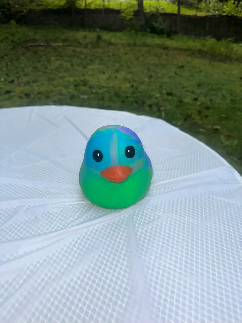 ONE Sunny Days Squeeezy tiedye duck jumbo squishy squeezy fidget toy multicolor